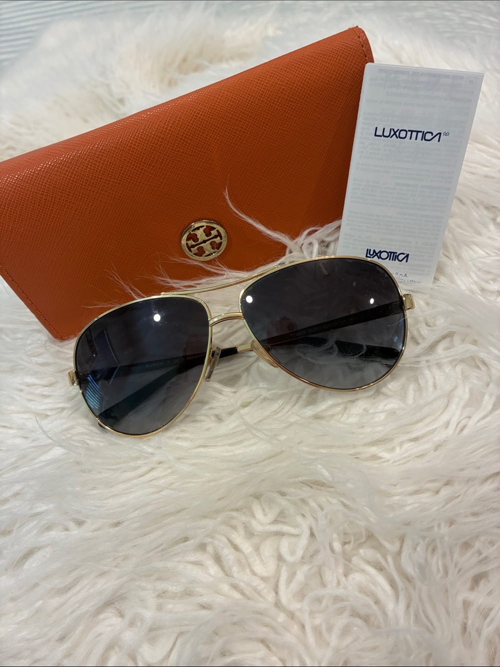 Tory Burch Gold Aviator Sunglasses with Black Gradient Lenses and Orange Case